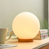 minimalist-mini-moon-wooden-desk-lamp-with-white-glass-globe-shade-for-bedside