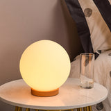 minimalist-mini-moon-wooden-desk-lamp-with-white-glass-globe-shade-for-bedside