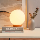 minimalist-mini-moon-wooden-desk-lamp-with-white-glass-globe-shade-for-bedside