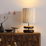 polished-walnut-stacked-oval-base-table-lamp-with-classic-beige-fabric-lampshade