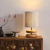 polished-walnut-stacked-oval-base-table-lamp-with-classic-beige-fabric-lampshade