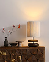 polished-walnut-stacked-oval-base-table-lamp-with-classic-beige-fabric-lampshade