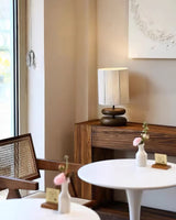polished-walnut-stacked-oval-base-table-lamp-with-classic-beige-fabric-lampshade