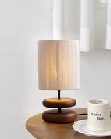 polished-walnut-stacked-oval-base-table-lamp-with-classic-beige-fabric-lampshade