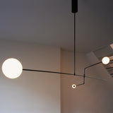 Modern Minimalist Linear Mobile Chandelier with Opal Glass Globes and Black Finish