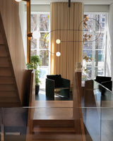 Modern Minimalist Linear Mobile Chandelier with Opal Glass Globes and Black Finish