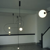 Modern Minimalist Linear Mobile Chandelier with Opal Glass Globes and Black Finish