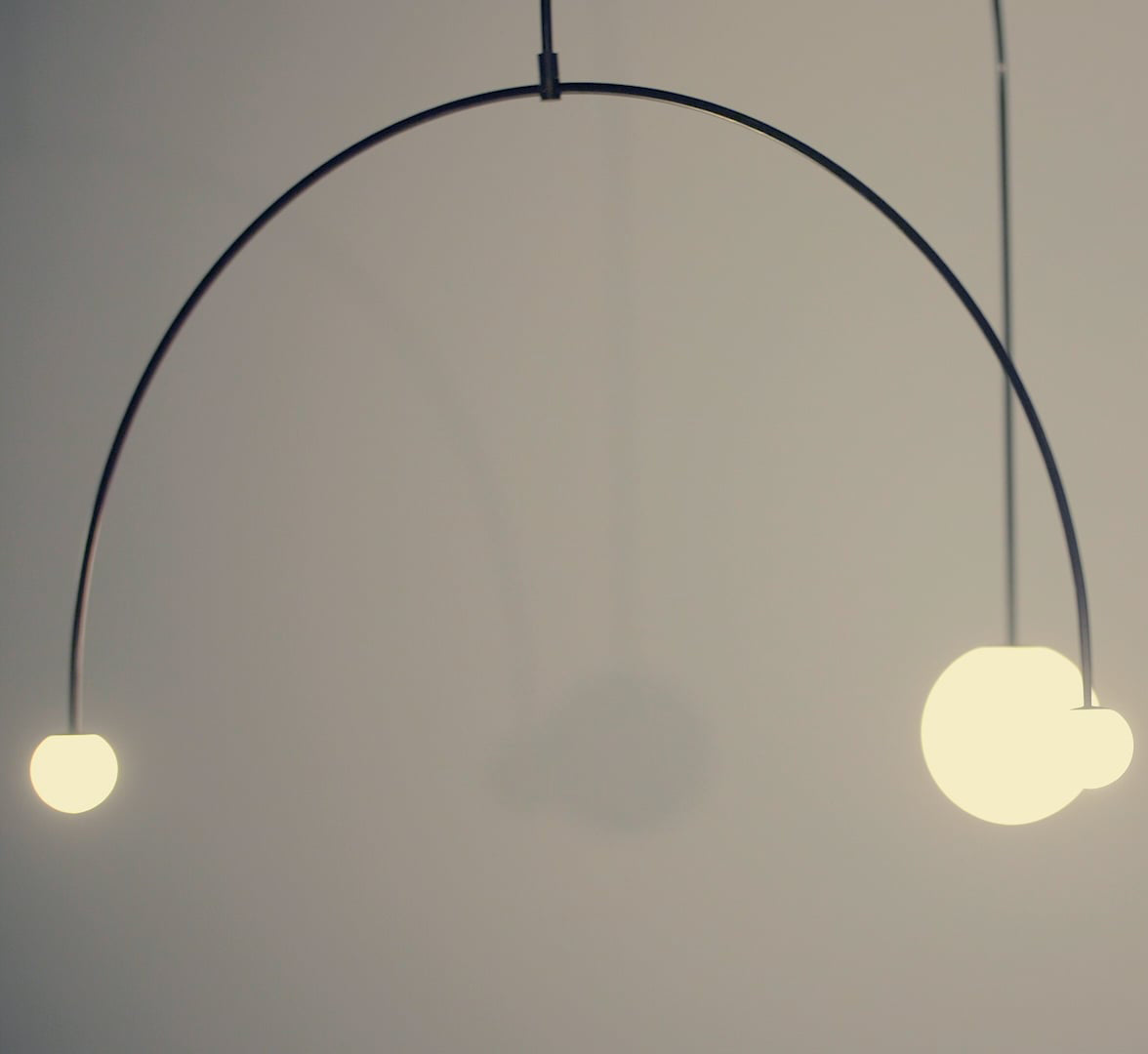 Modern Minimalist Linear Mobile Chandelier with Opal Glass Globes and Black Finish
