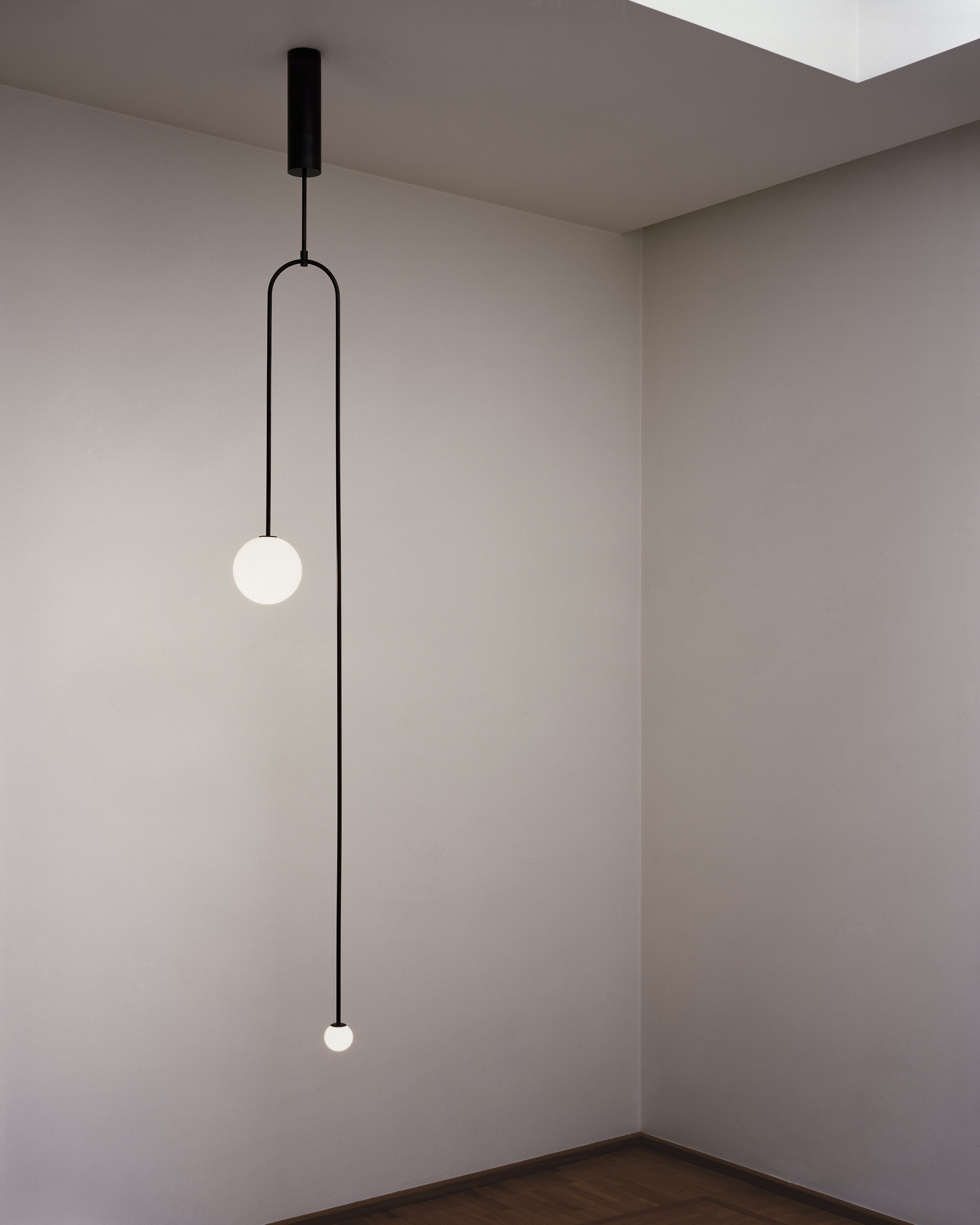 Modern Minimalist Linear Mobile Chandelier with Opal Glass Globes and Black Finish