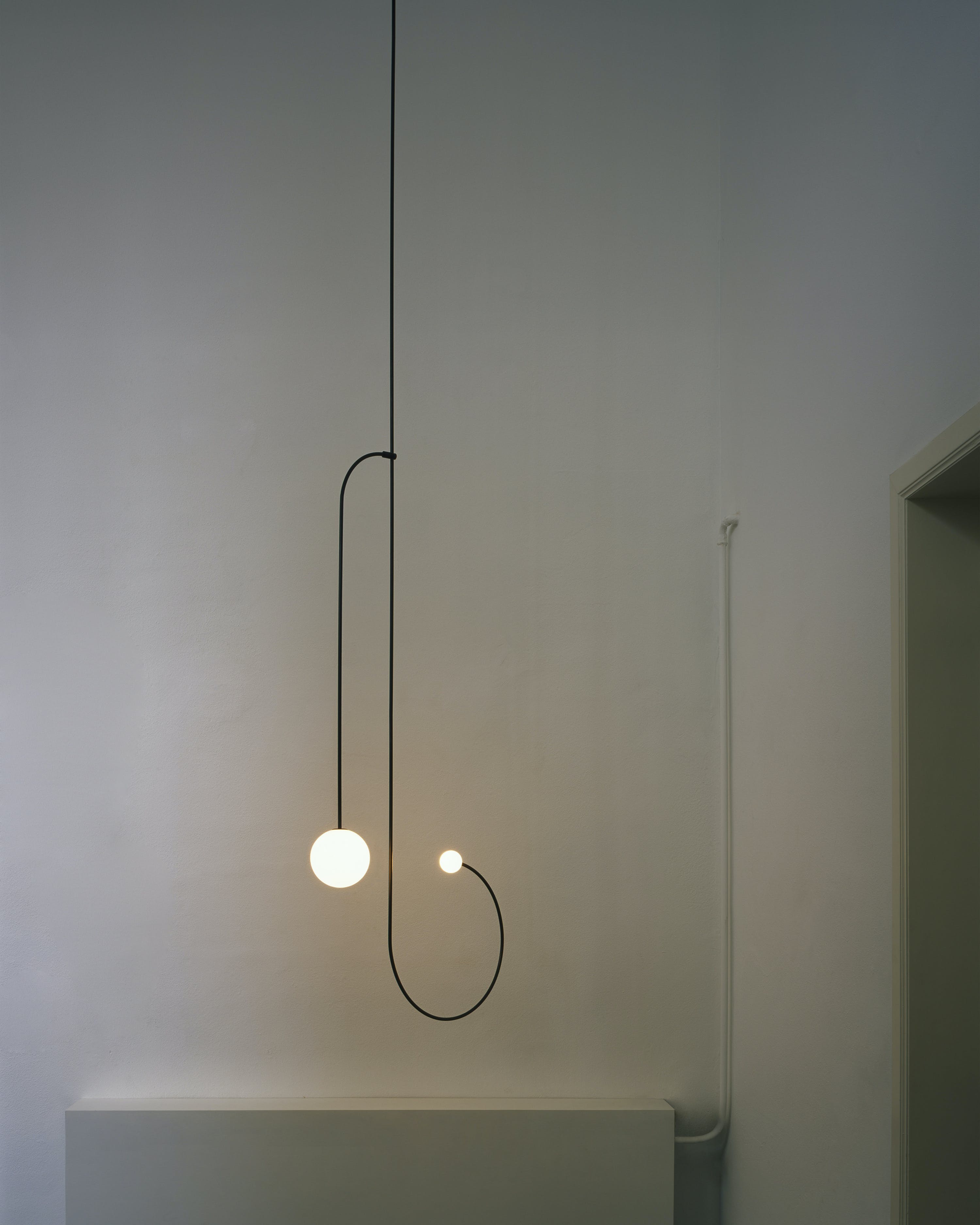 Modern Minimalist Linear Mobile Chandelier with Opal Glass Globes and Black Finish