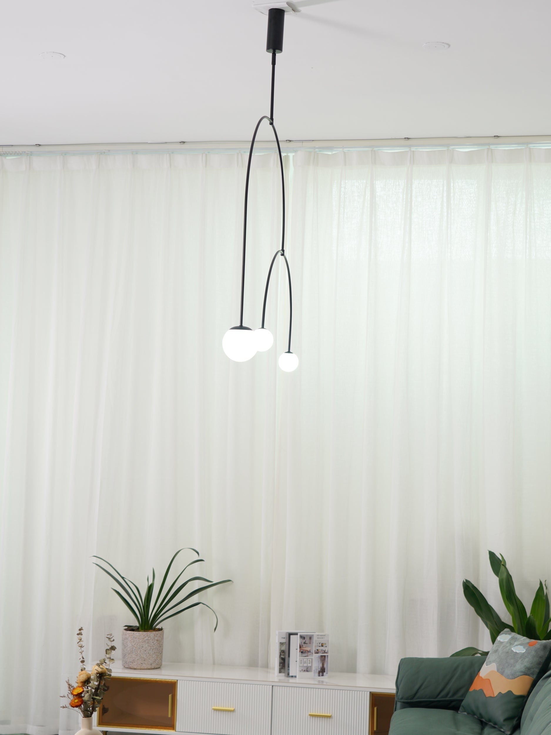 Modern Minimalist Linear Mobile Chandelier with Opal Glass Globes and Black Finish