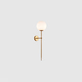 modern-brass-and-opal-glass-sphere-mobile-wall-sconce-lighting-for-indoor-spaces
