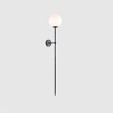 modern-brass-and-opal-glass-sphere-mobile-wall-sconce-lighting-for-indoor-spaces