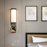 modern-chinese-wall-sconce-geometric-brass-and-white-glass-interior-accent-lighting