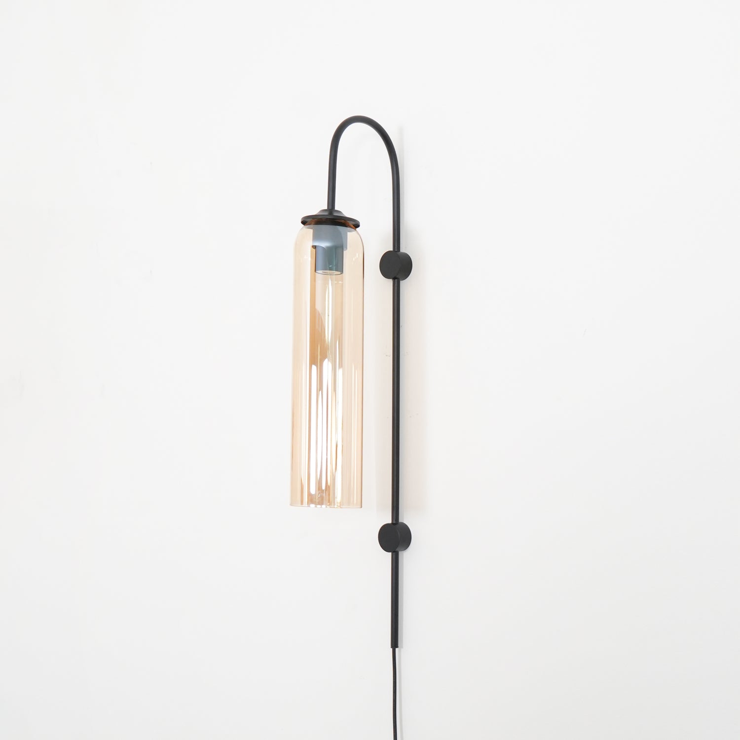 modern-cylinder-glass-wall-sconce-with-plug-in-cord-for-interior-lighting