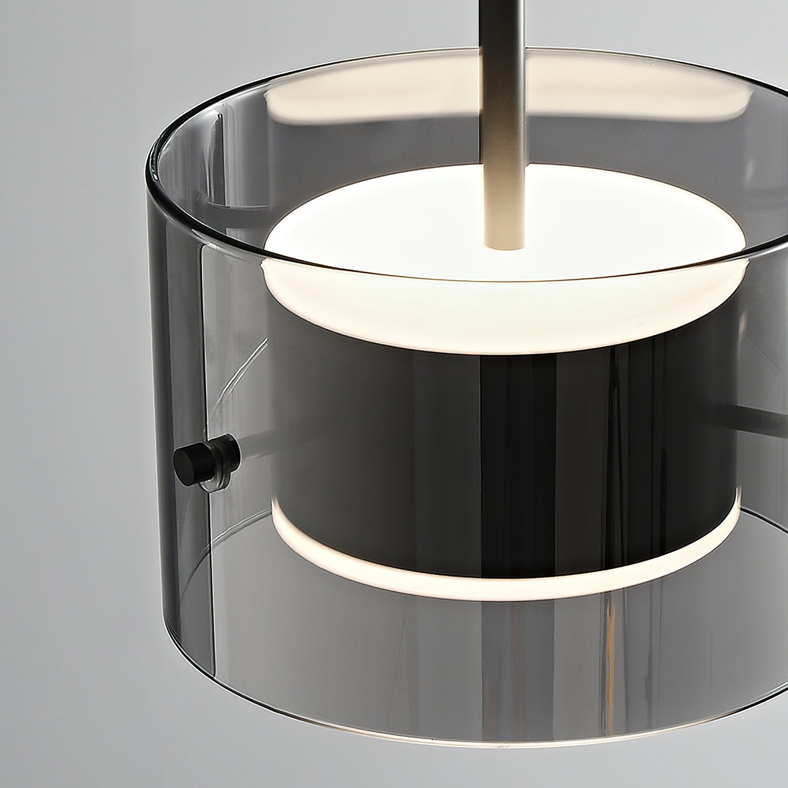 modern-brass-and-smoke-gray-glass-globe-led-pendant-light-for-living-room-and-bedroom