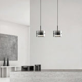modern-brass-and-smoke-gray-glass-globe-led-pendant-light-for-living-room-and-bedroom