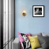 modern-handcrafted-solid-brass-wall-sconce-with-clear-glass-shade-and-integrated-led