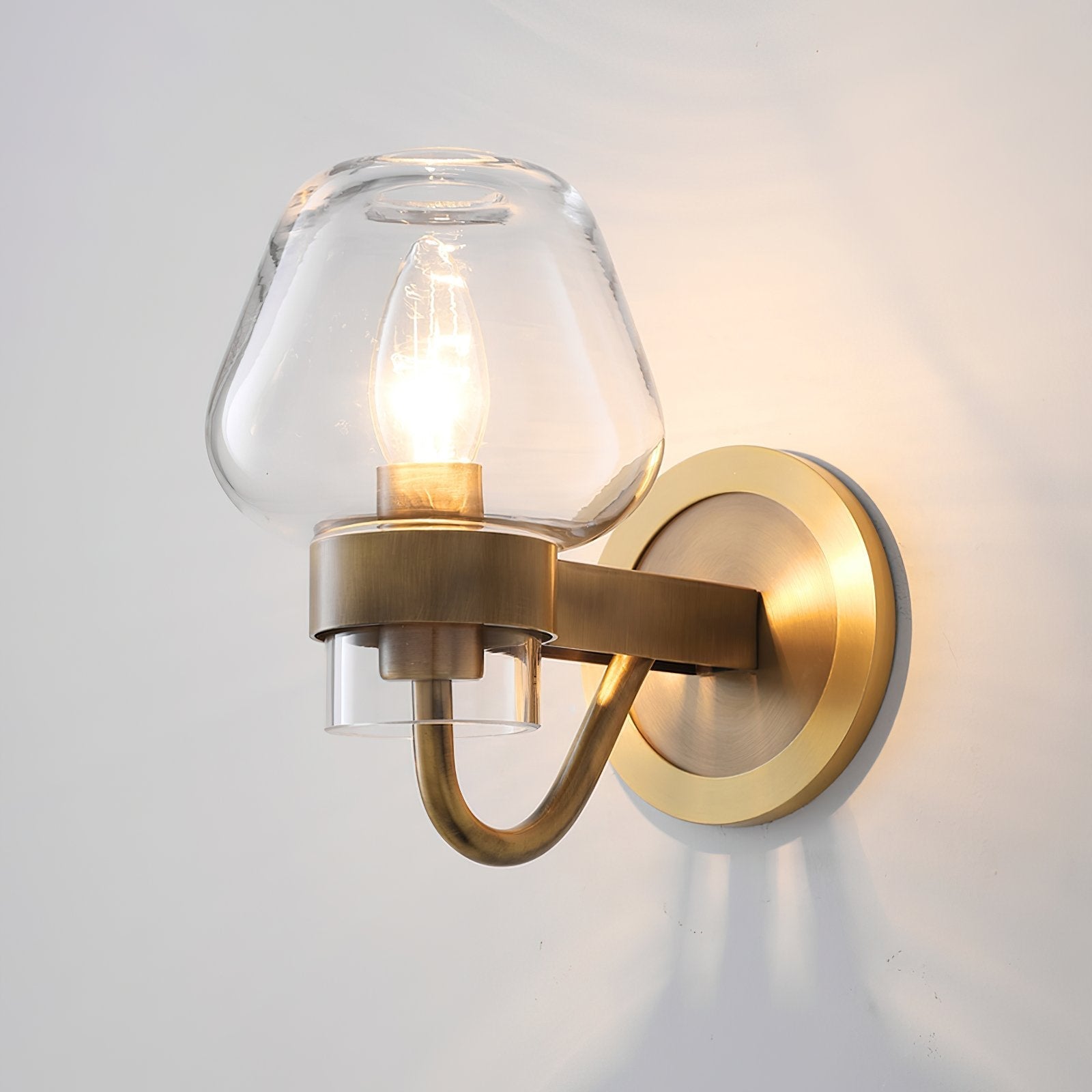 modern-handcrafted-solid-brass-wall-sconce-with-clear-glass-shade-and-integrated-led