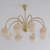 morup-elegant-floral-brass-and-resin-chandelier-with-shimmering-arches-and-cream-accents
