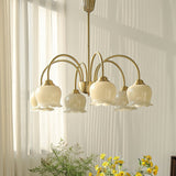 morup-elegant-floral-brass-and-resin-chandelier-with-shimmering-arches-and-cream-accents