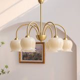 morup-elegant-floral-brass-and-resin-chandelier-with-shimmering-arches-and-cream-accents