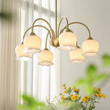 morup-elegant-floral-brass-and-resin-chandelier-with-shimmering-arches-and-cream-accents