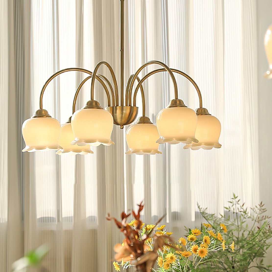 morup-elegant-floral-brass-and-resin-chandelier-with-shimmering-arches-and-cream-accents