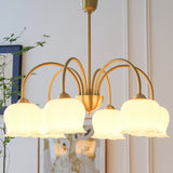 morup-elegant-floral-brass-and-resin-chandelier-with-shimmering-arches-and-cream-accents