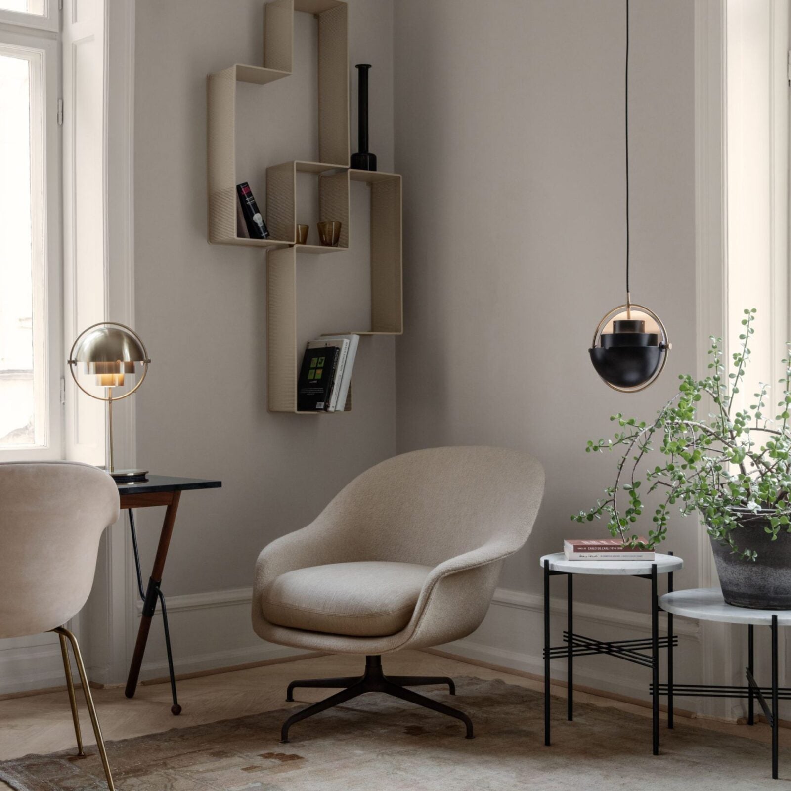 modern-sculptural-spherical-table-lamp-with-adjustable-metal-shades-and-copper-finish