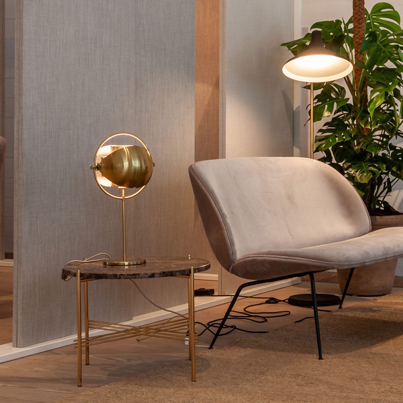 modern-sculptural-spherical-table-lamp-with-adjustable-metal-shades-and-copper-finish