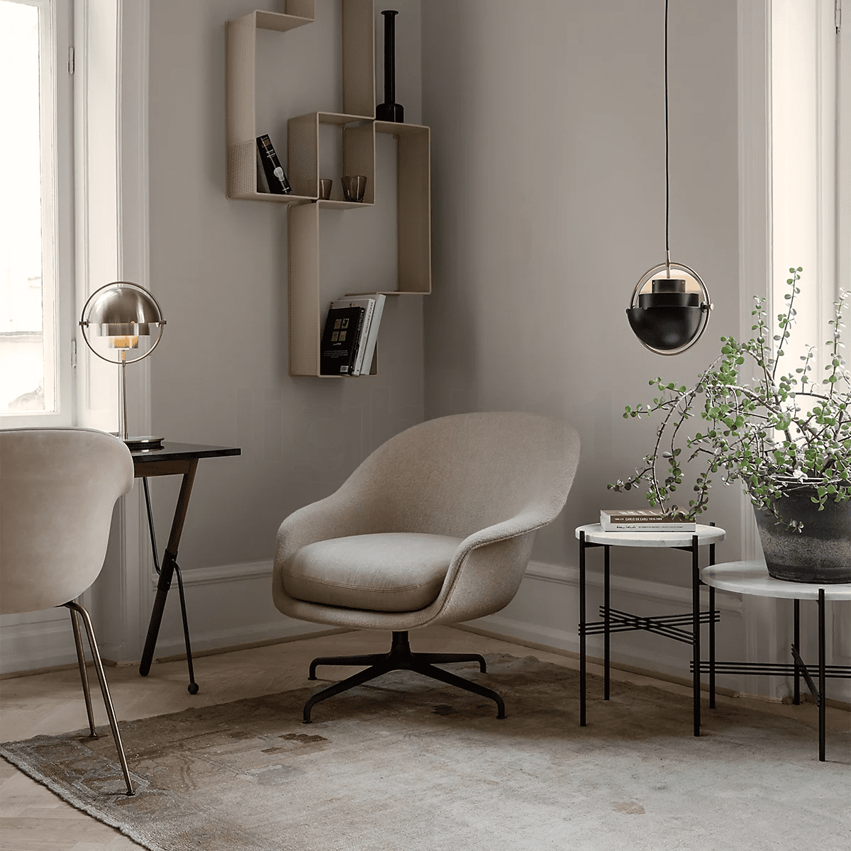 modern-sculptural-spherical-table-lamp-with-adjustable-metal-shades-and-copper-finish