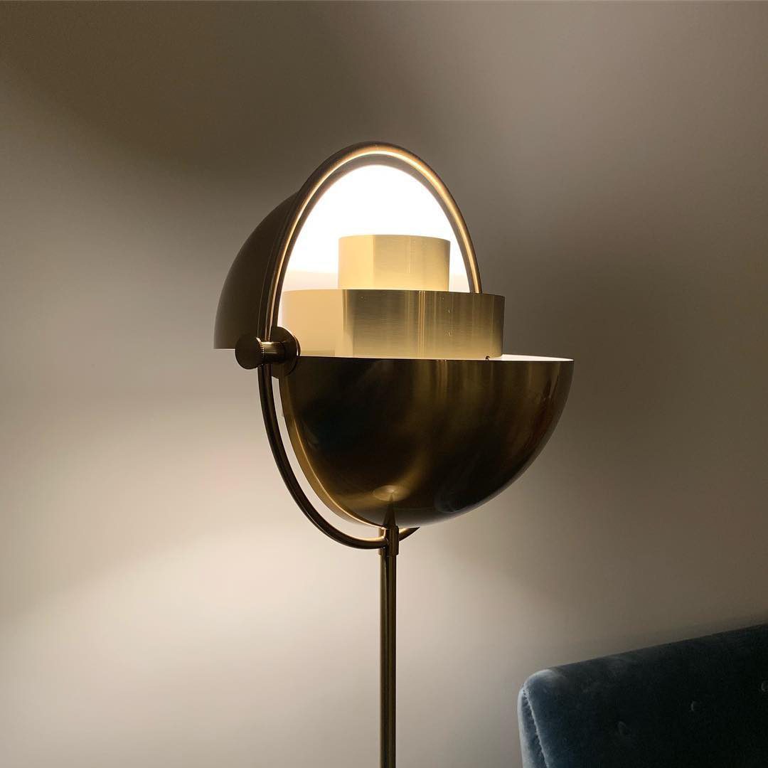 modern-sculptural-spherical-table-lamp-with-adjustable-metal-shades-and-copper-finish