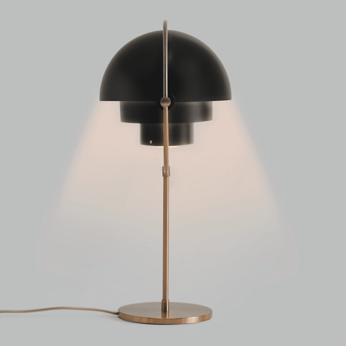 modern-sculptural-spherical-table-lamp-with-adjustable-metal-shades-and-copper-finish