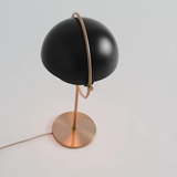 modern-sculptural-spherical-table-lamp-with-adjustable-metal-shades-and-copper-finish