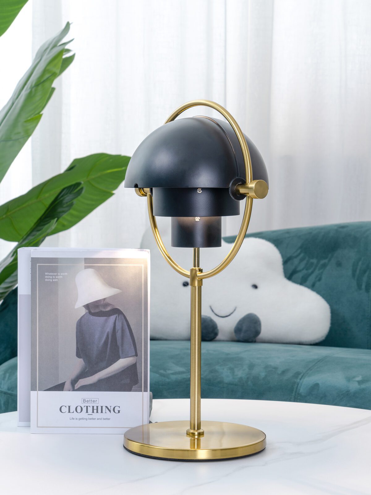 modern-sculptural-spherical-table-lamp-with-adjustable-metal-shades-and-copper-finish