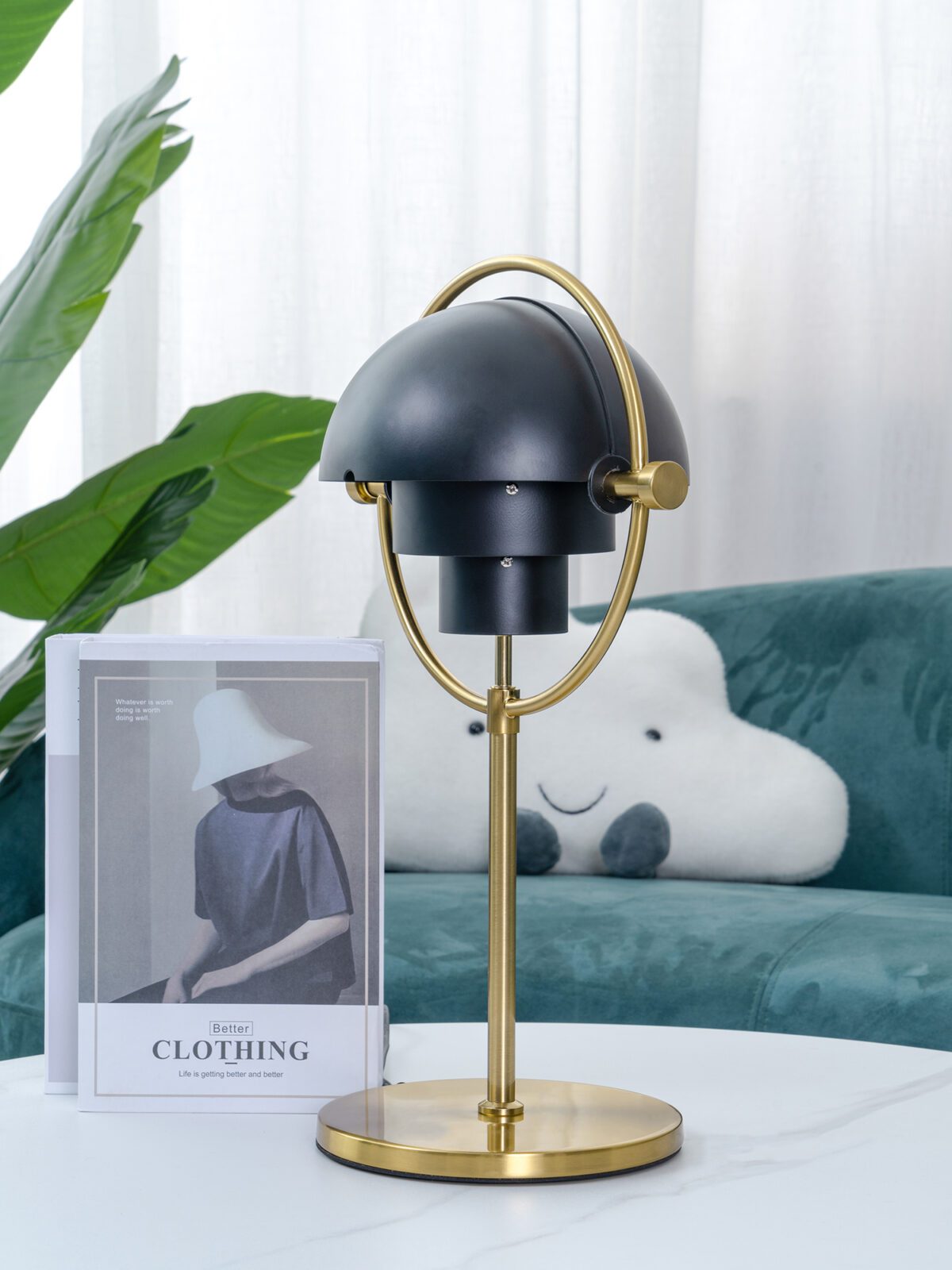 modern-sculptural-spherical-table-lamp-with-adjustable-metal-shades-and-copper-finish