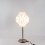 Modern Tripod Accent Table Lamp with White Polymer Bubble Shade for Elegant Interior Lighting