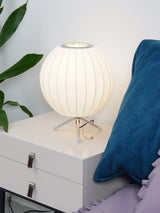 Modern Tripod Accent Table Lamp with White Polymer Bubble Shade for Elegant Interior Lighting
