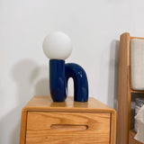 Modern Resin N Shape Table Lamp with Glass Globe for Creative Bedside and Office Lighting