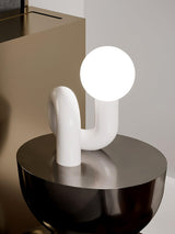 Modern Resin N Shape Table Lamp with Glass Globe for Creative Bedside and Office Lighting