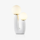 modern-resin-globe-table-lamp-with-sculptural-base-for-designer-home-decor
