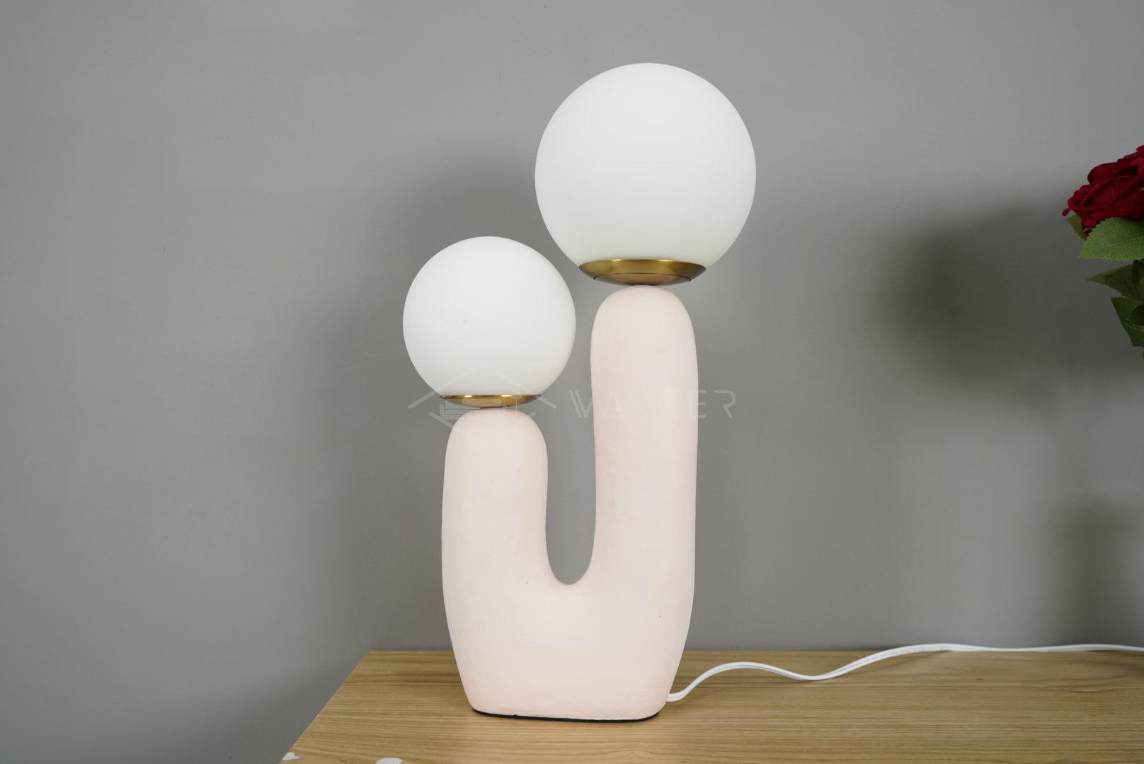 modern-resin-globe-table-lamp-with-sculptural-base-for-designer-home-decor