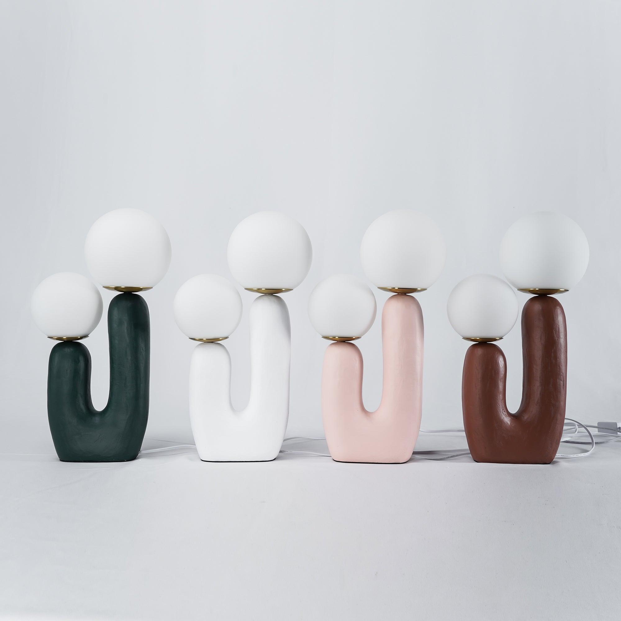 modern-resin-globe-table-lamp-with-sculptural-base-for-designer-home-decor