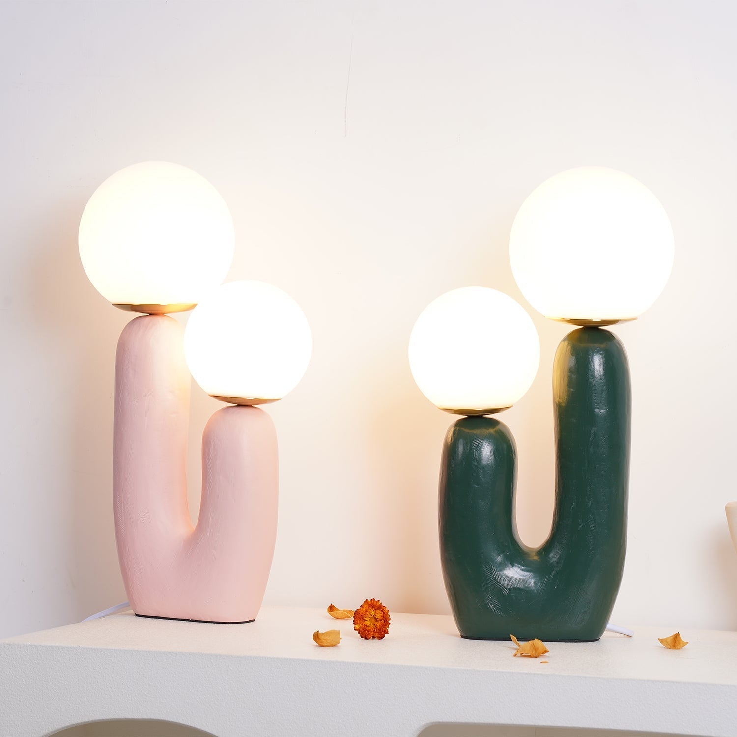 modern-resin-globe-table-lamp-with-sculptural-base-for-designer-home-decor