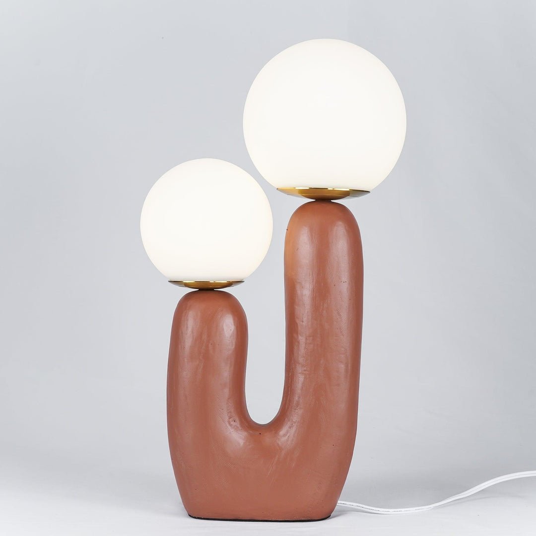 modern-resin-globe-table-lamp-with-sculptural-base-for-designer-home-decor