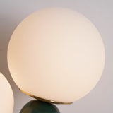 modern-resin-globe-table-lamp-with-sculptural-base-for-designer-home-decor