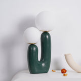 modern-resin-globe-table-lamp-with-sculptural-base-for-designer-home-decor