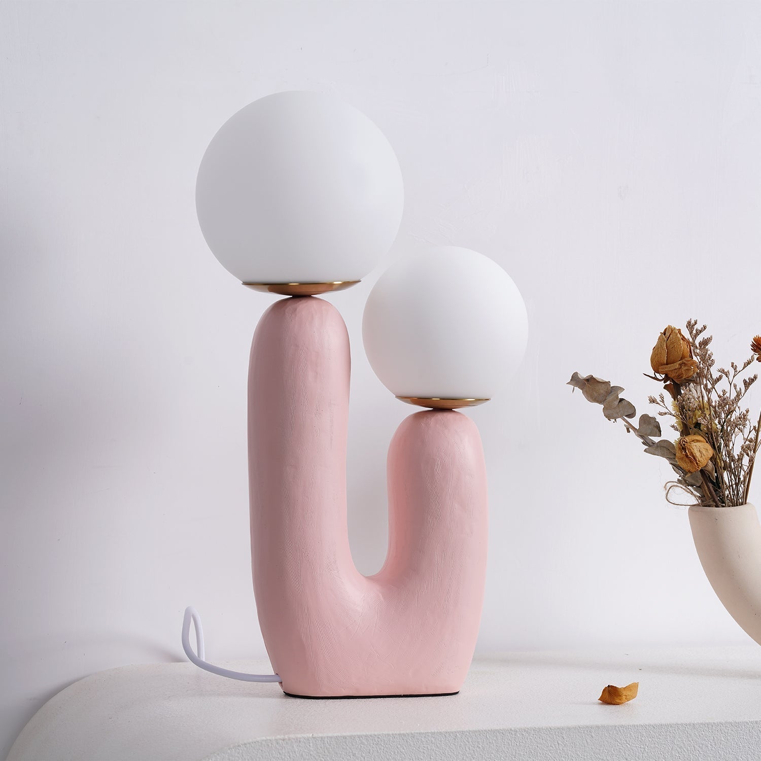 modern-resin-globe-table-lamp-with-sculptural-base-for-designer-home-decor