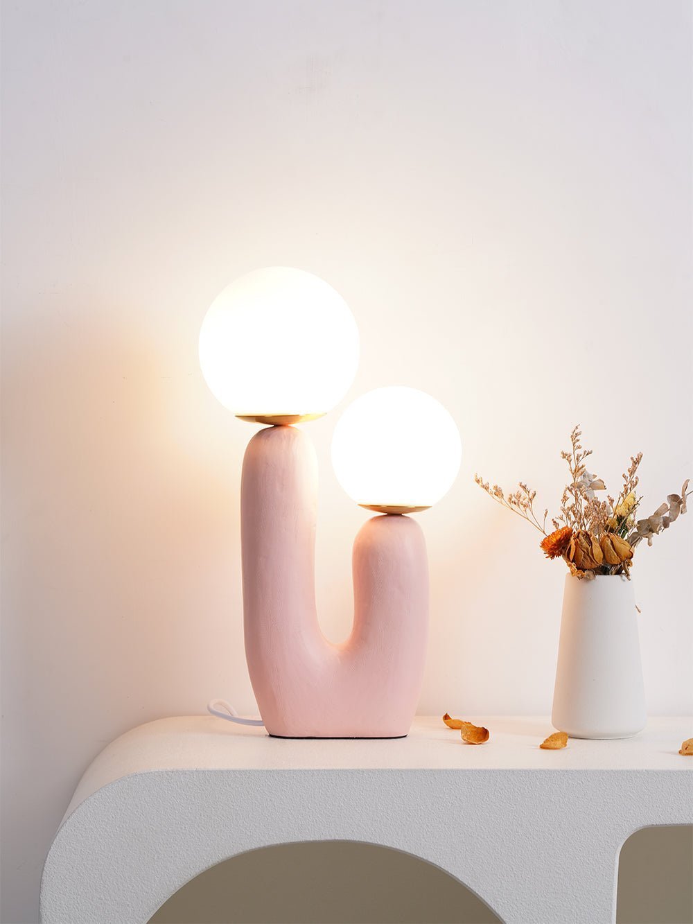 modern-resin-globe-table-lamp-with-sculptural-base-for-designer-home-decor